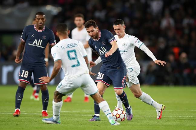 Foden playing against Messi in a Champions League game in 2021. (Image Credit: Getty)